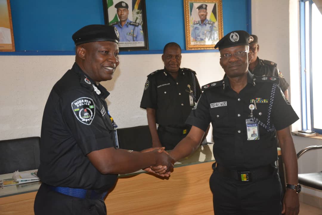CP, Kayode Egbetokun exchanging pleasantries with newly promoted officers.