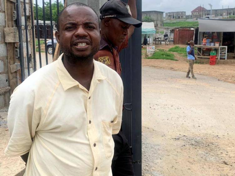 A menial worker name withheld who passed the night in the estate standing beside Abraham John one of the security officer of Jenew Homes on duty.