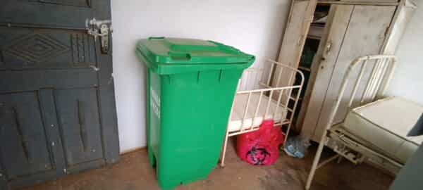 A room where records waste disposable are kept also serves as consulting room.