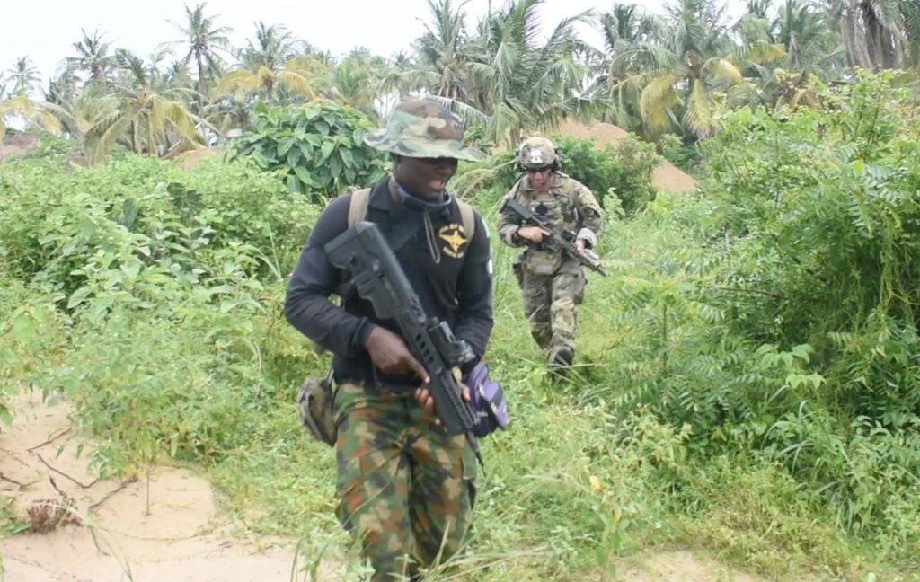 An officer of the Nigerian Navy Special Boat Service left during the five week Joint Combined Exchange Training JCET alongside a team of U.S. Army Special Forces 1024x648 1