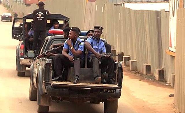 Armed policemen on patrol in Abeokuta
