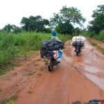 Two smugglers with motorcycle loaded with rice heading back to Nigeria