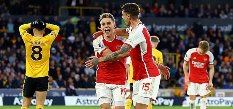 Arsenal players celebrating after scoring against Wolves