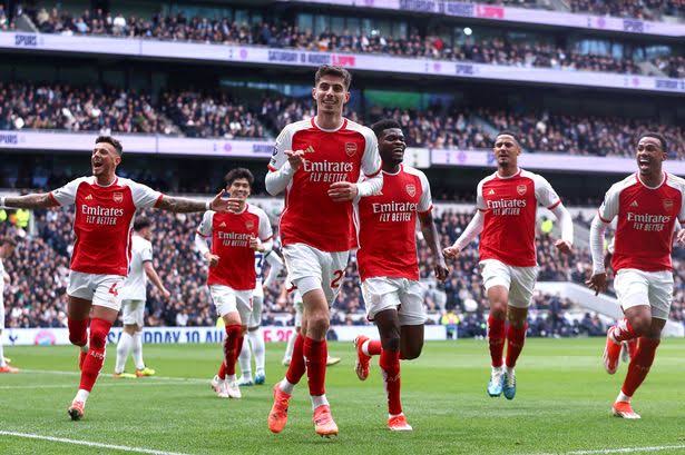 Arsenal team celebrating their goals against Tottenham