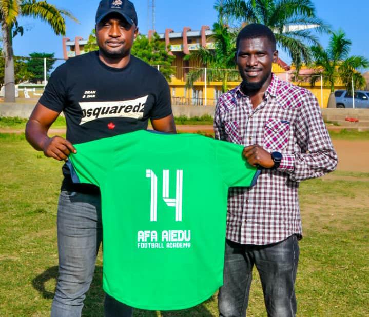 Former Super Eagle player, Eneramo champions grassroots football, unveils new AFA lafiagi jersey